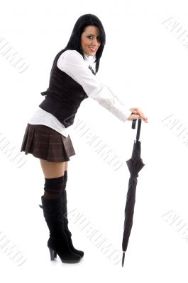 female posing holding an umbrella