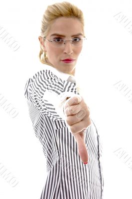 side view of businesswoman with thumbs down
