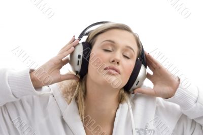 woman listening to music with closed eyes