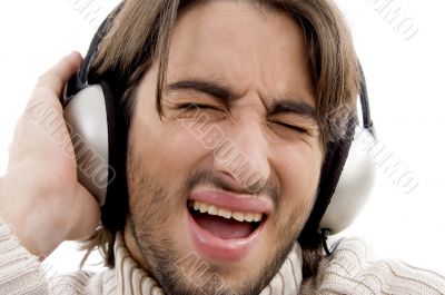 handsome man listening music on headphone