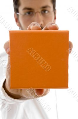 man showing jewellery box
