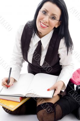 female student making her notes