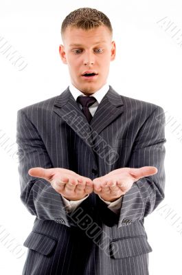 surprised businessman looking at his palms