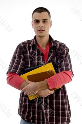 student holding books