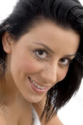 close up of smiling model looking at camera