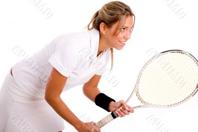 side view of tennis player going to play