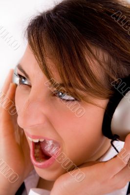 side view of executive enjoying music