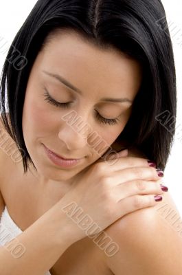 top view of woman touching her body