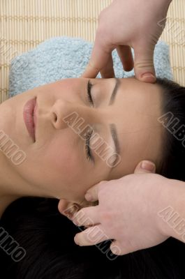 top view of woman taking head massage
