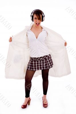 full body pose of shouting woman wearing overcoat