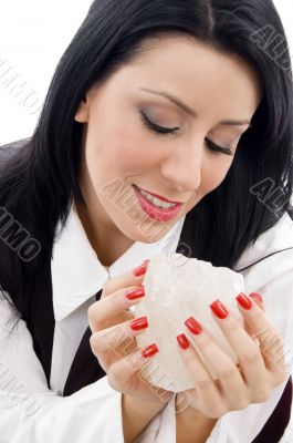 woman holding a rock