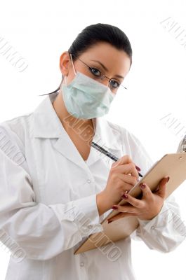 doctor with writing pad and mask on white backgrou