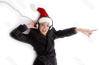 pointing woman with christmas hat