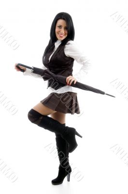 young woman holding umbrella