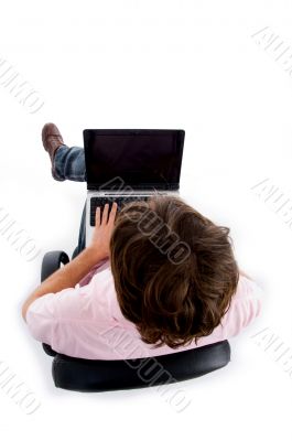 high angle view of man working on laptop