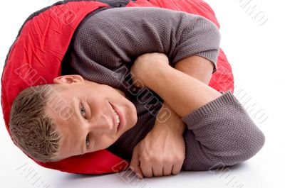 man in sleeping bag lying