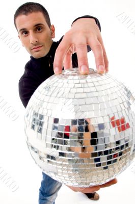 man holding disco ball like a globe
