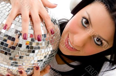 woman holding disco mirror ball