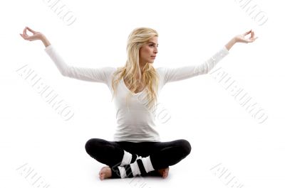 front view of woman practicing yoga