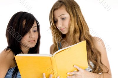 classmate looking in book