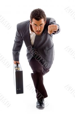 young executive running to office