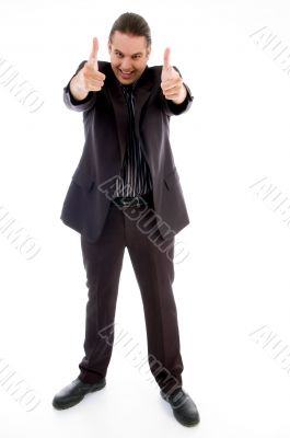 businessman pointing towards camera