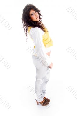 young pretty female standing in front of camera