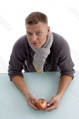 young man with apple