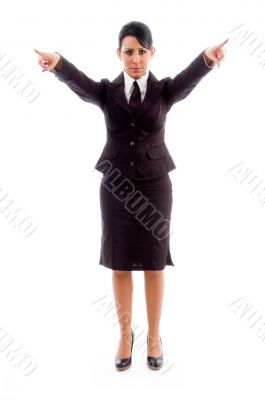 young businesswoman pointing with both hands