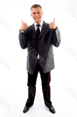 standing professional with thumbs up