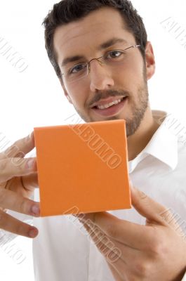 young man showing jewellery box