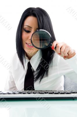 woman looking through lens