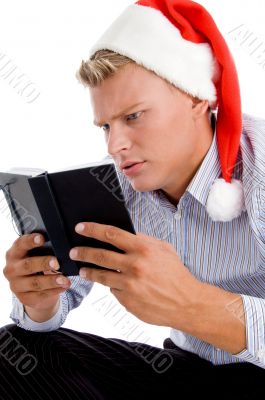 man reading diary