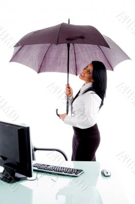 young professional holding umbrella