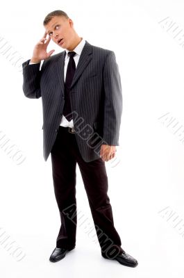 stressed businessman in tension looking upward