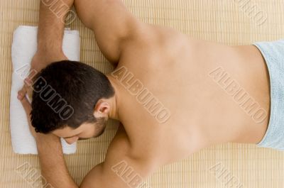 man lying down for spa treatment