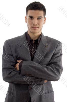young executive standing with crossed arms