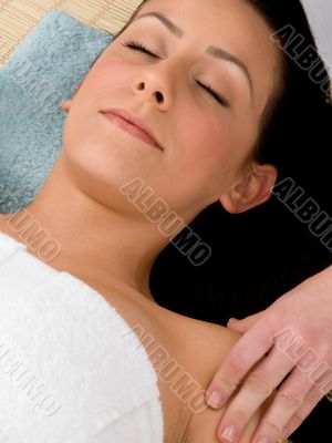 top view of female taking massage