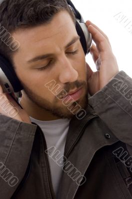 close up of man listening to music