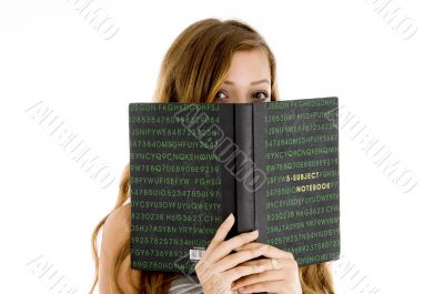school girl hiding her face