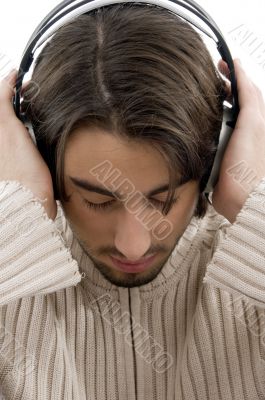 young guy male enjoying music with headphones