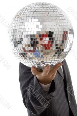 young guy hidden his face with disco ball