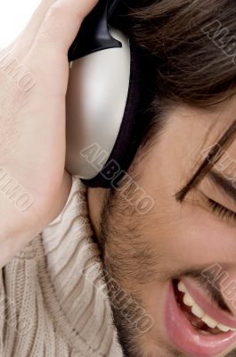 male enjoying music on headphone