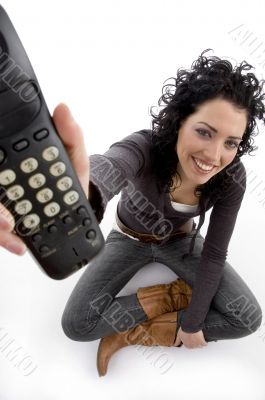 smiling female showing remote