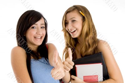 laughing students showing thumbs up