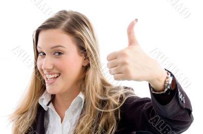 female with thumbs up