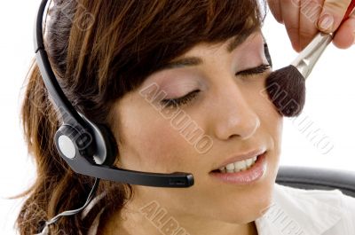 customer care executive applying blusher