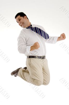 successful businessman jumping high