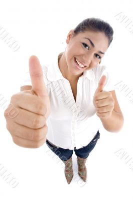 young caucasian showing thumbs up hand gesture