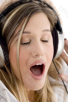 woman listening to music with closed eyes